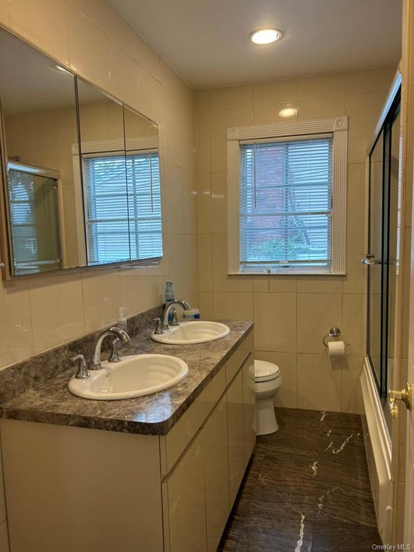 Bathroom, Dual Sink Vanities, Glass Shower, Interior, Marble, Recessed Lighting