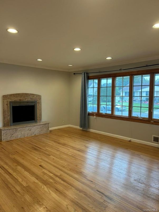 Empty room, Fireplace, Interior, Recessed Lighting, Wood Texture Flooring
