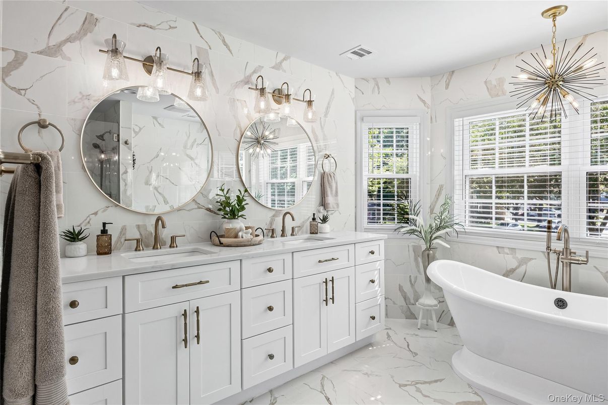 Bathroom, Dual Sink Vanities, Free Standing Baths, Interior, Marble, Marble Walls, Pendant Lights