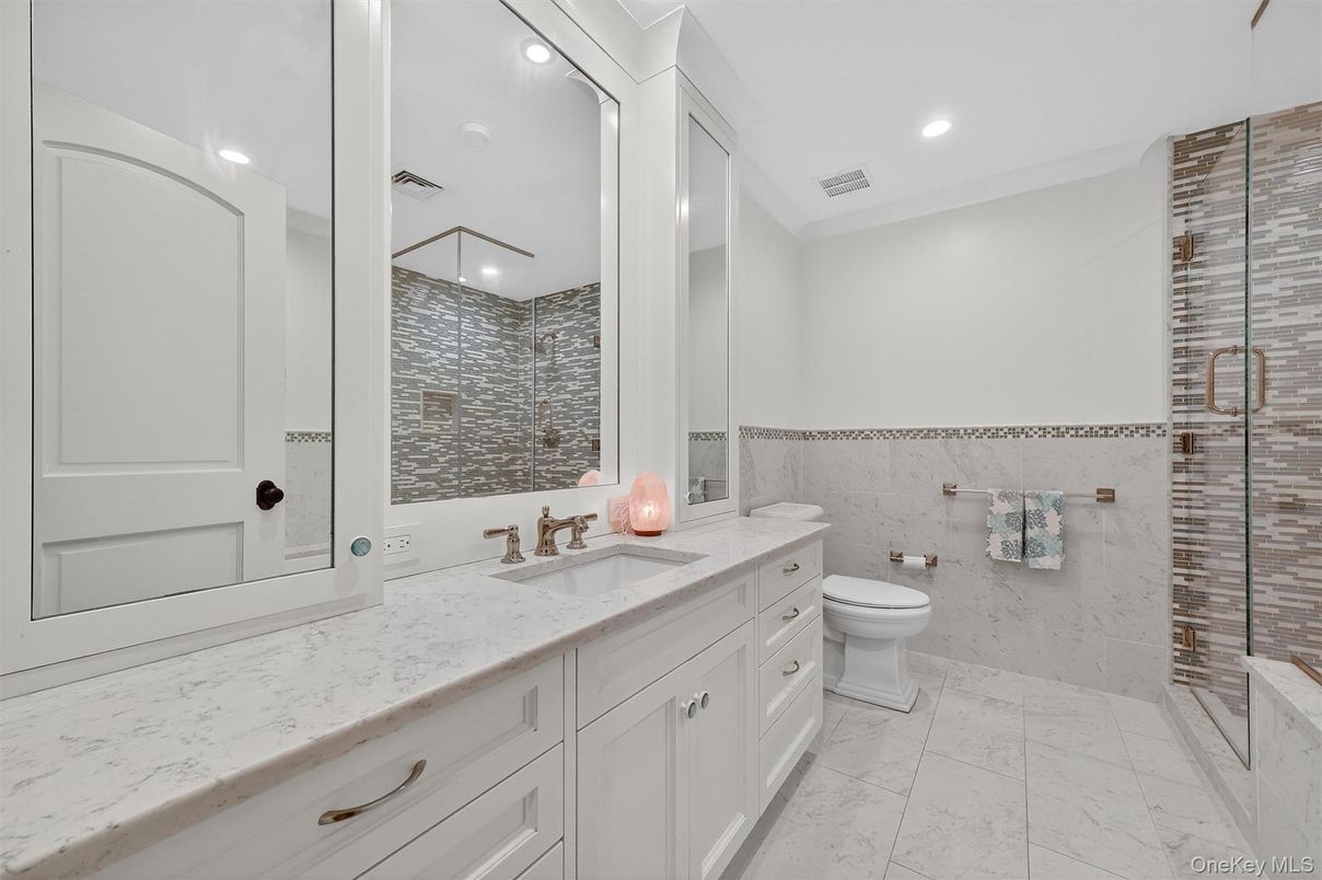 Bathroom, Dual Sink Vanities, Glass Shower, Interior, Marble, Recessed Lighting