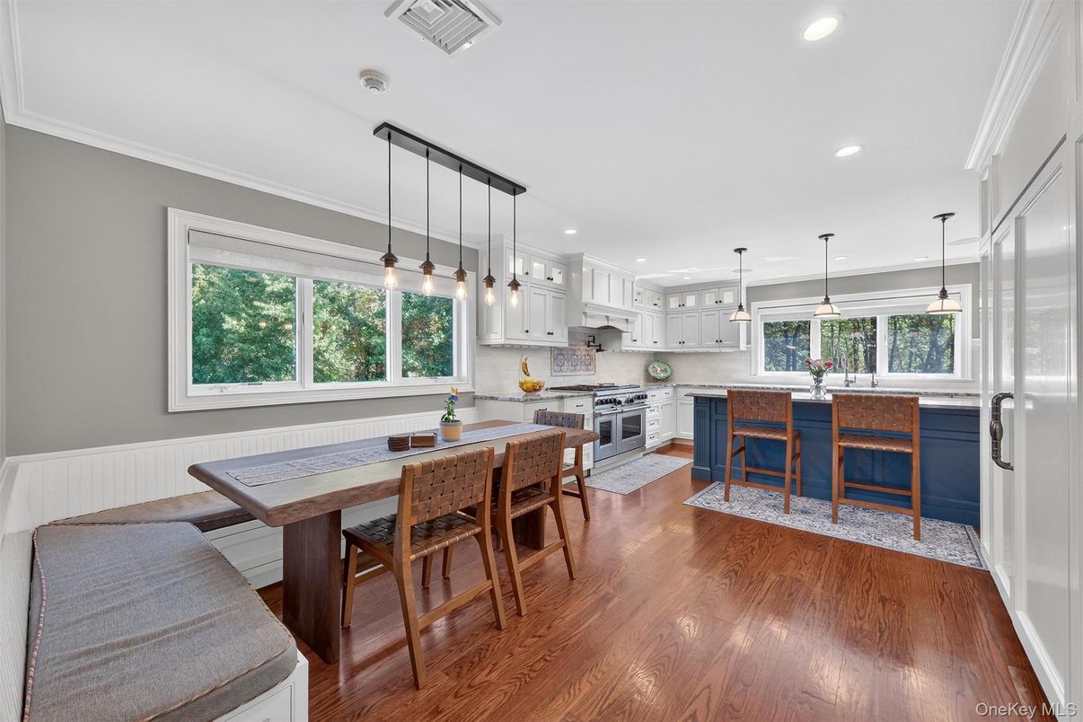 Dining room, Interior, Kitchen, Pendant Lights, Recessed Lighting, Stainless Steel Appliances, Wood Texture Flooring