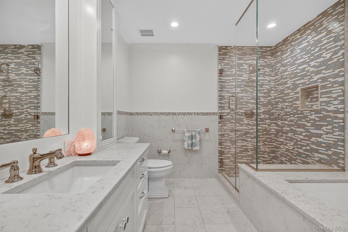 Bathroom, Dual Sink Vanities, Glass Shower, Interior, Marble, Recessed Lighting