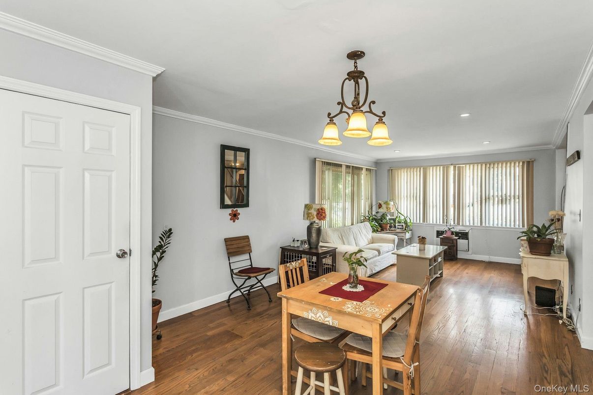 Chandelier, Dining room, Fireplace, Interior, Living room, Recessed Lighting, Wood Texture Flooring