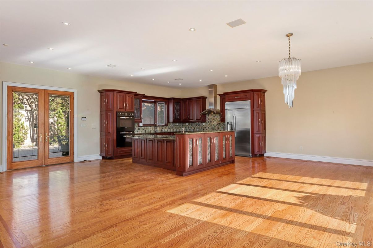 Chandelier, Interior, Kitchen, Recessed Lighting, Stainless Steel Appliances, Wood Texture Flooring