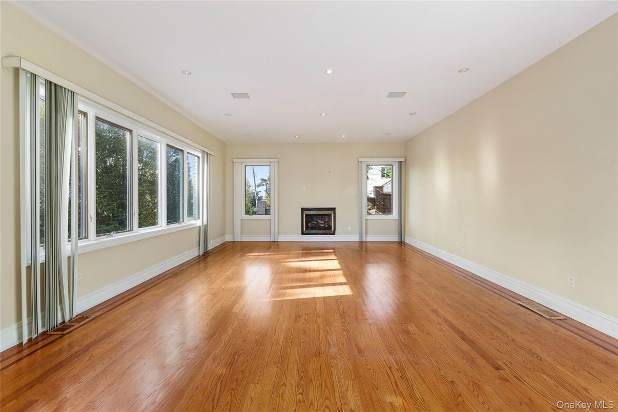 Empty room, Fireplace, Interior, Recessed Lighting, Wood Texture Flooring