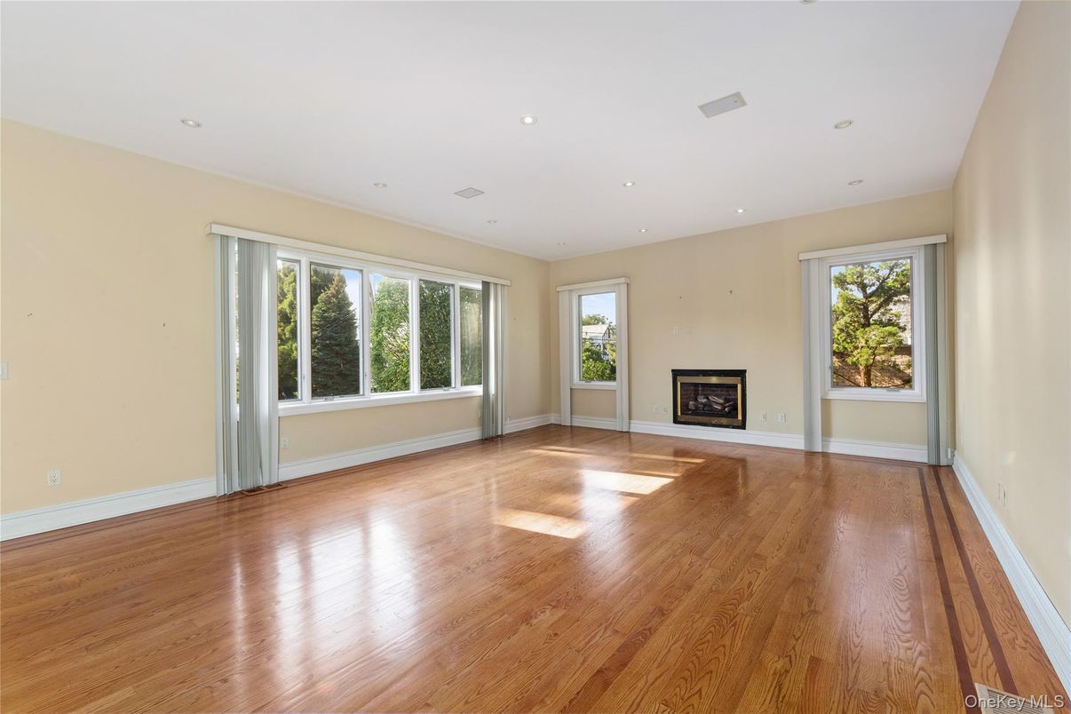 Empty room, Fireplace, Interior, Recessed Lighting, Wood Texture Flooring
