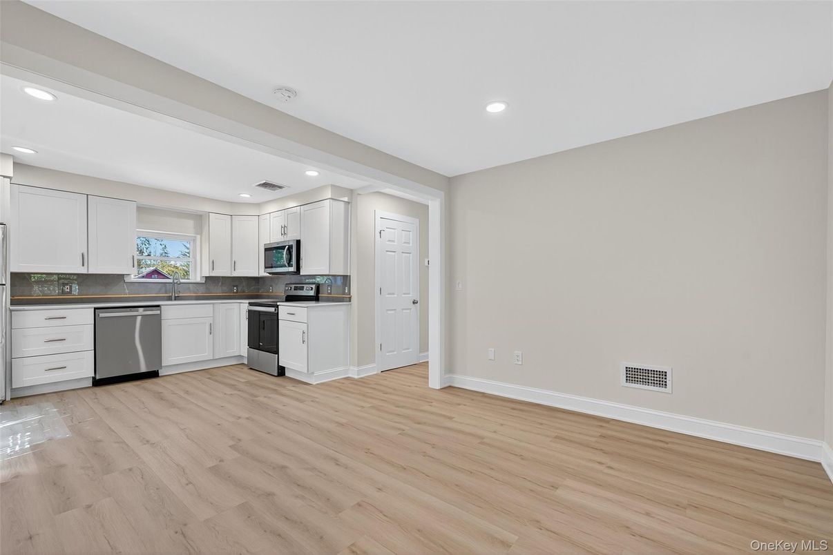 Interior, Kitchen, Recessed Lighting, Stainless Steel Appliances, Wood Texture Flooring