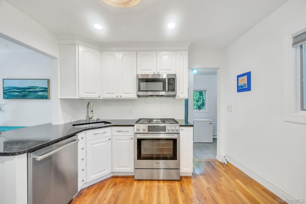 Interior, Kitchen, Recessed Lighting, Stainless Steel Appliances, Wood Texture Flooring