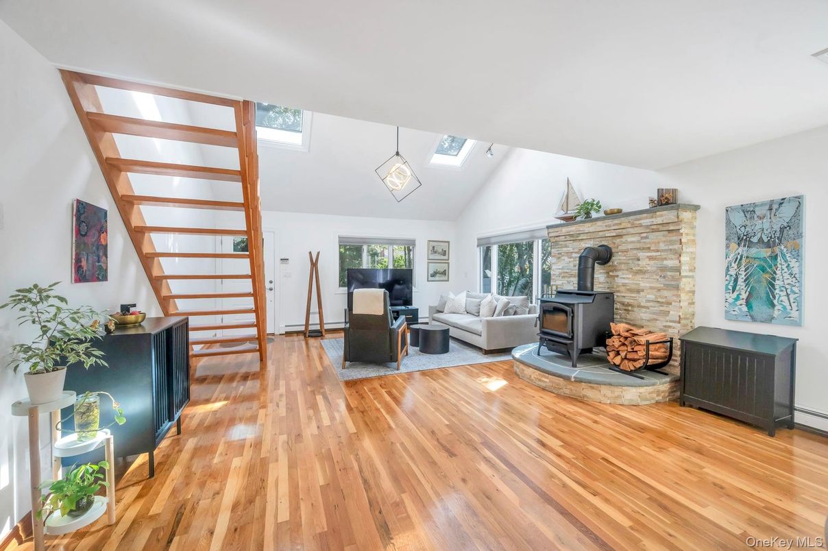 Fireplace, Interior, Living room, Pendant Lights, Stone Walls, Wood Texture Flooring