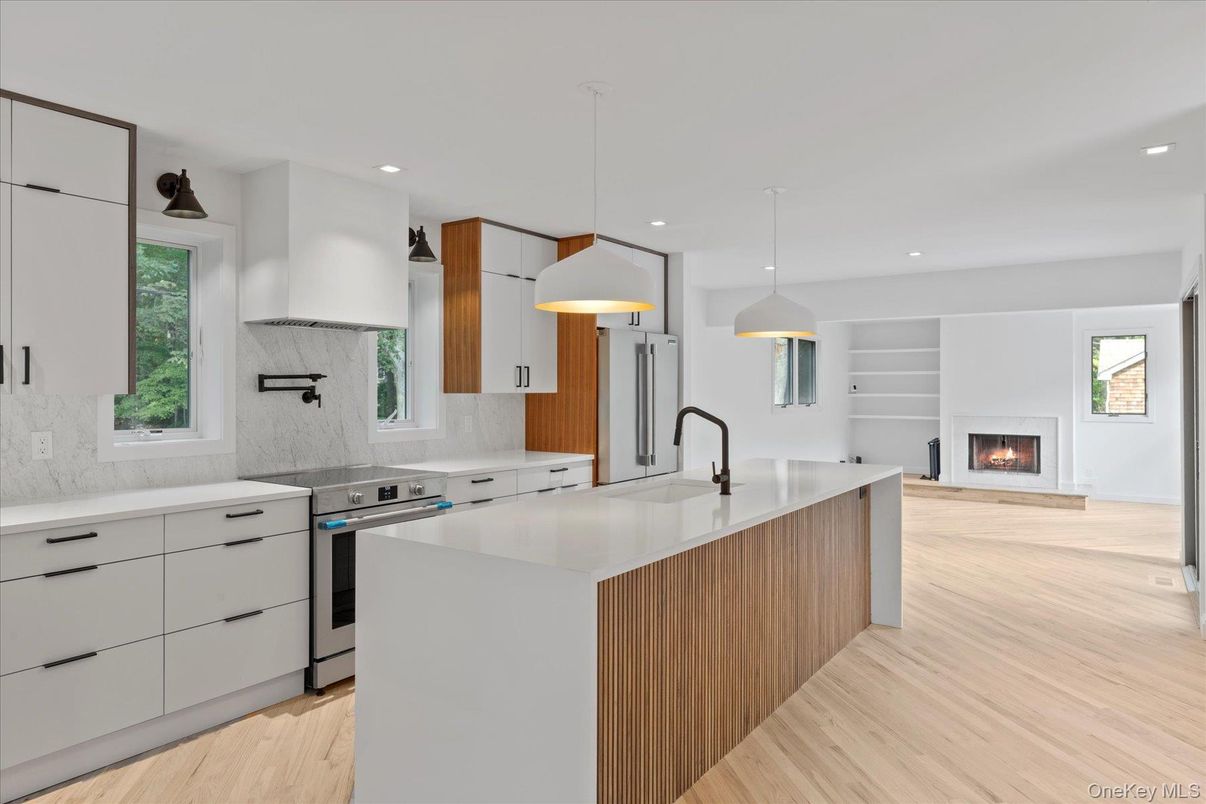 Fireplace, Interior, Kitchen, Pendant Lights, Recessed Lighting, Stainless Steel Appliances, Wood Texture Flooring