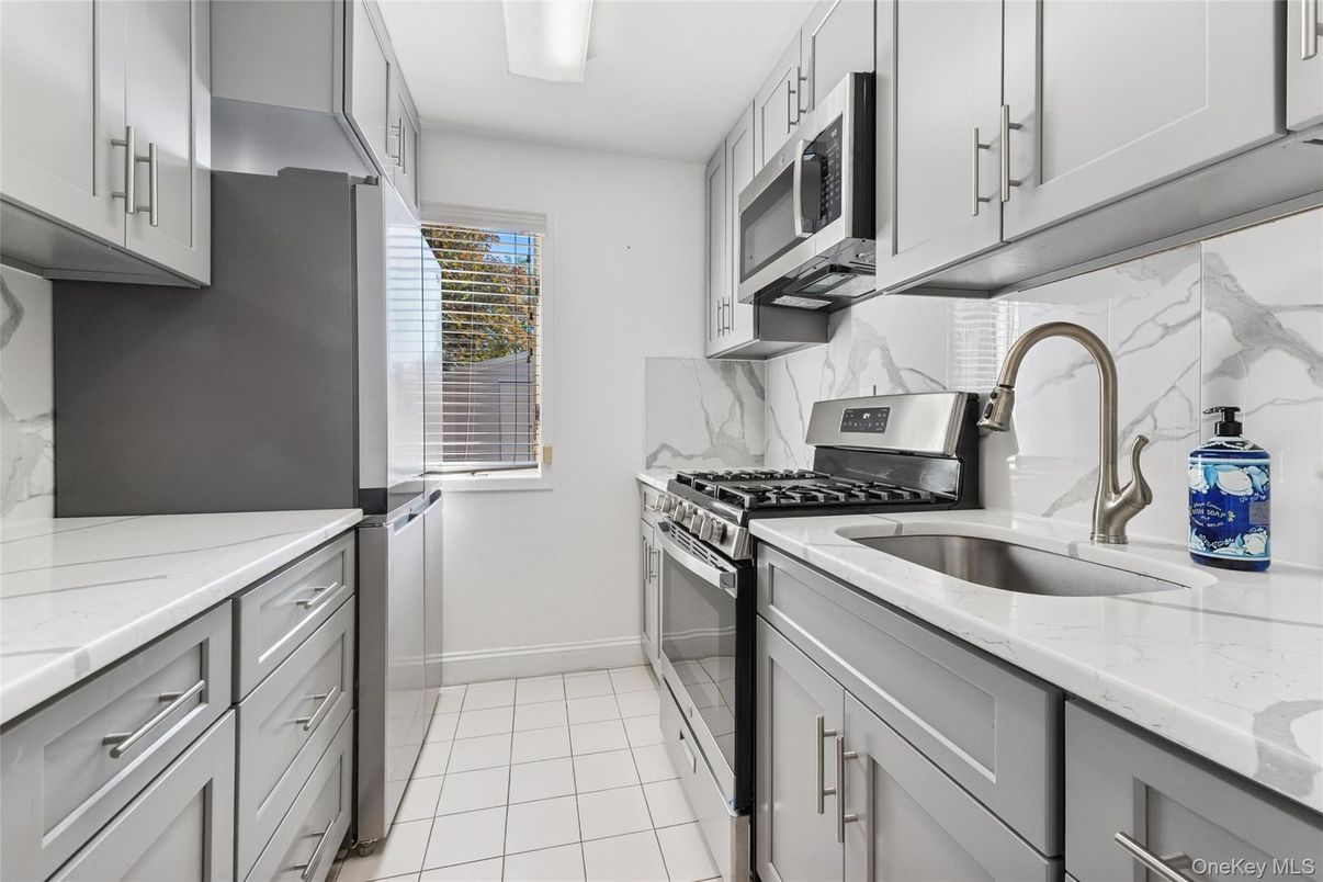 Interior, Kitchen, Marble Walls, Stainless Steel Appliances