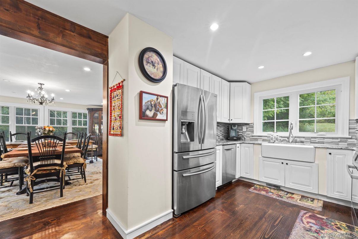 Chandelier, Dining room, Interior, Kitchen, Recessed Lighting, Stainless Steel Appliances, Wood Texture Flooring