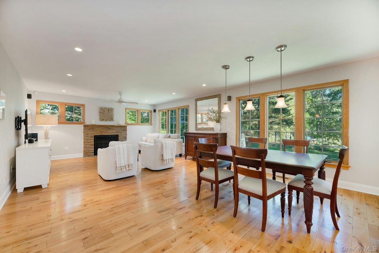 Dining room, Fireplace, Interior, Living room, Pendant Lights, Recessed Lighting, Stone Walls, Wood Texture Flooring