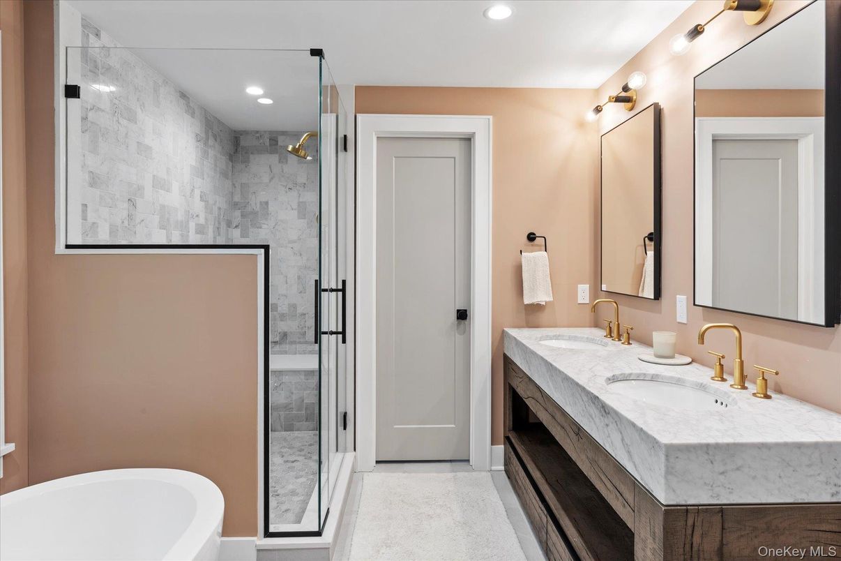 Bathroom, Dual Sink Vanities, Glass Shower, Interior, Marble Walls, Recessed Lighting
