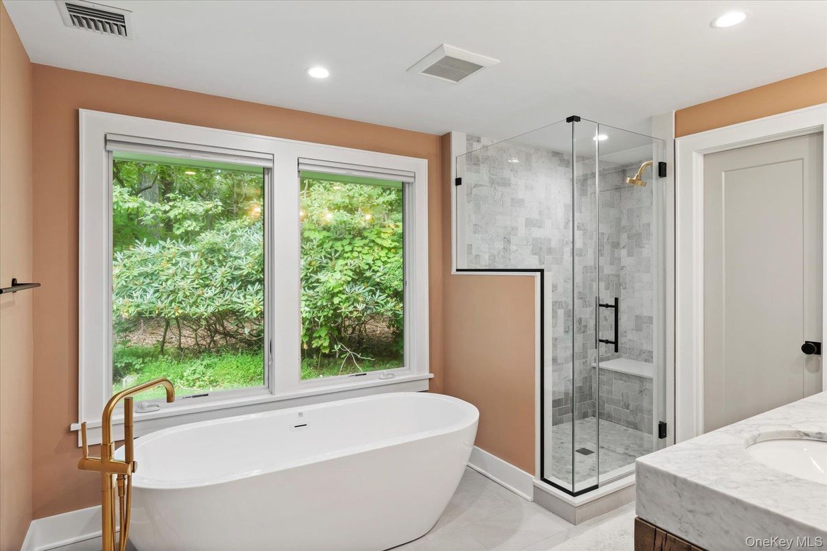 Bathroom, Free Standing Baths, Glass Shower, Interior, Marble Walls, Recessed Lighting