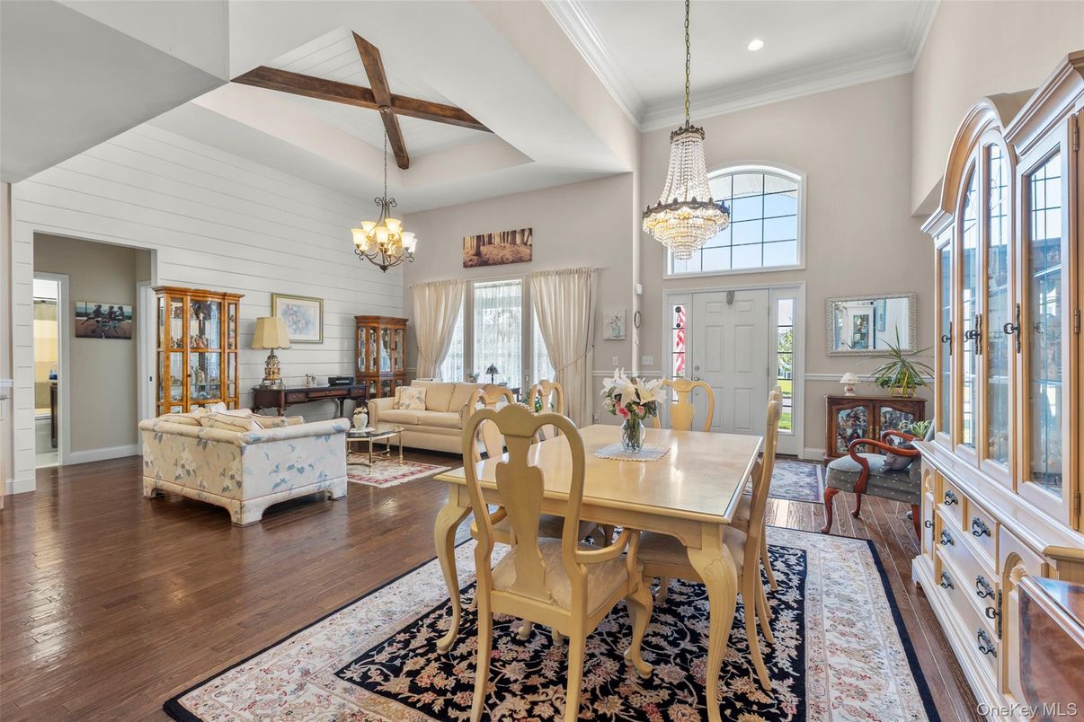 Chandelier, Dining room, Interior, Living room, Pendant Lights, Recessed Lighting, Wooden Beams, Wood Texture Flooring