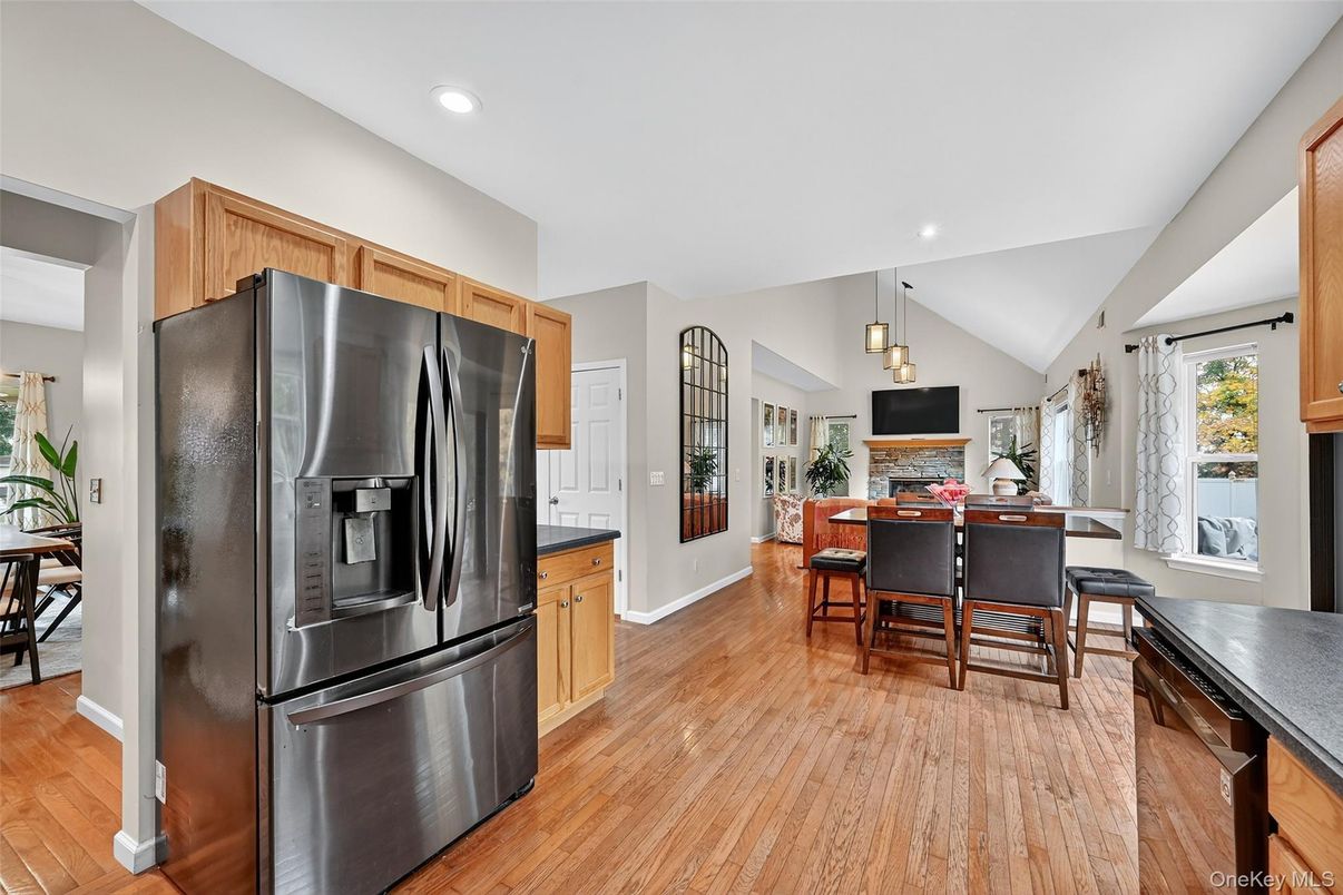 Dining room, Fireplace, Interior, Kitchen, Pendant Lights, Recessed Lighting, Wood Texture Flooring