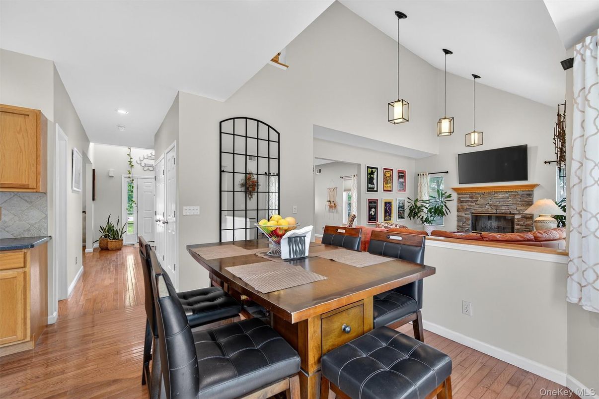 Dining room, Fireplace, Interior, Kitchen, Pendant Lights, Recessed Lighting, Wood Texture Flooring