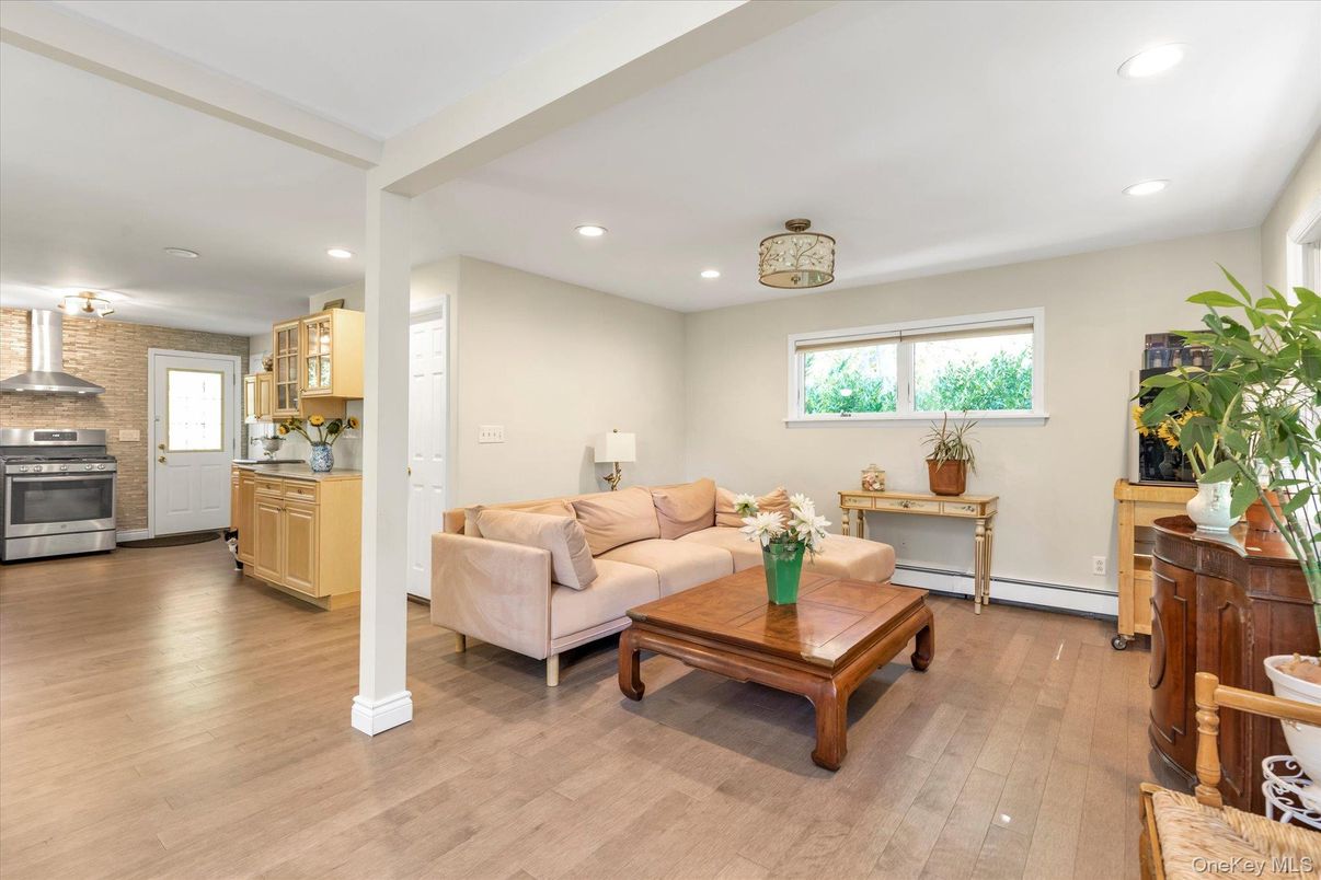 Interior, Kitchen, Living room, Recessed Lighting, Stainless Steel Appliances, Stone Walls, Wood Texture Flooring