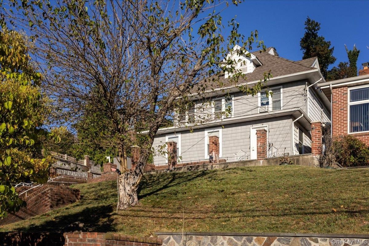 Backyard, Exterior, Facade, Brick Facade, American Foursquare