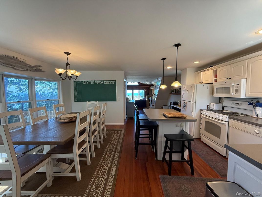 Chandelier, Dining room, Interior, Kitchen, Pendant Lights, Recessed Lighting, Water, Wood Texture Flooring