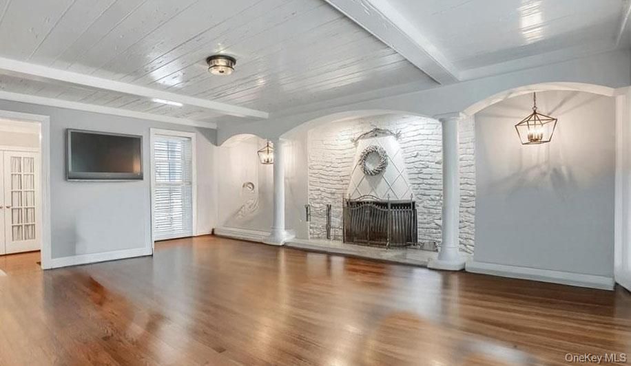 Empty room, Fireplace, Interior, Pendant Lights, Stone Walls, Wood Texture Flooring