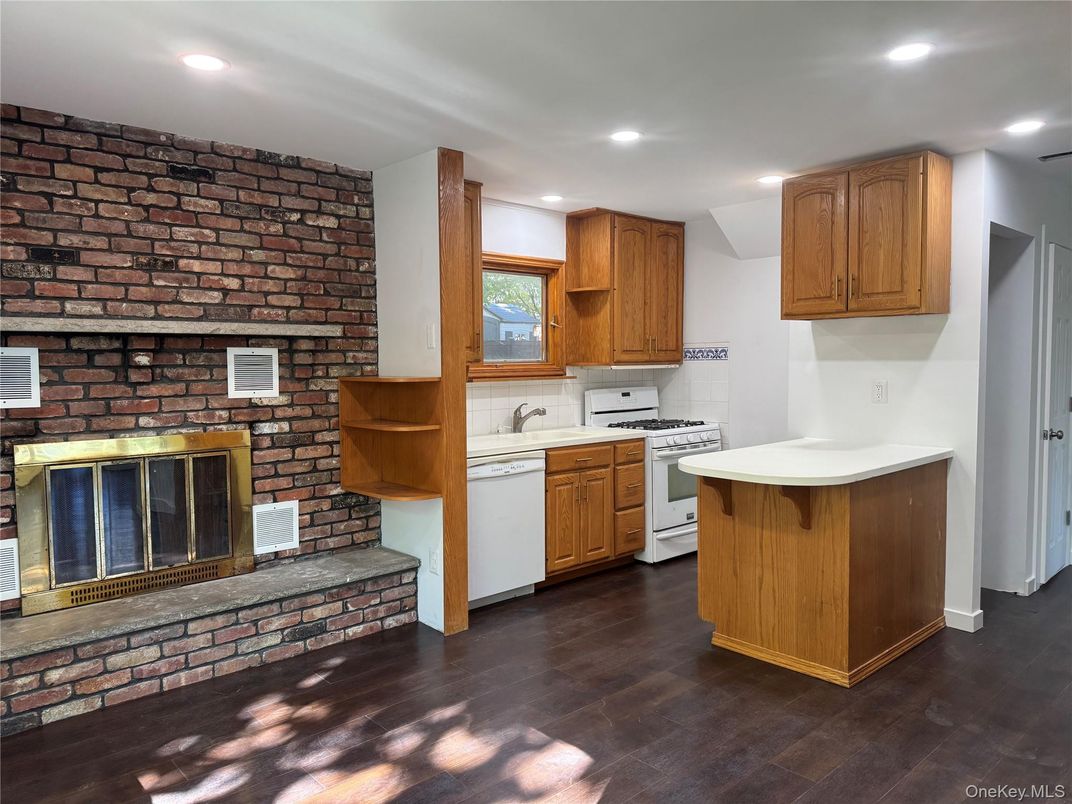 Fireplace, Interior, Kitchen, Recessed Lighting, Stone Walls, Wood Texture Flooring