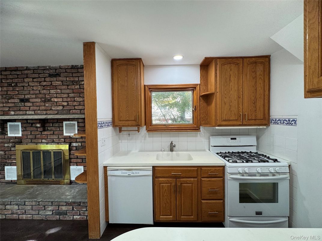 Fireplace, Interior, Kitchen, Recessed Lighting, Stone Walls