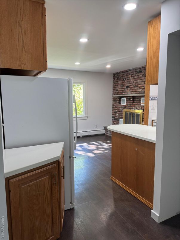 Fireplace, Interior, Kitchen, Recessed Lighting, Stone Walls, Wood Texture Flooring