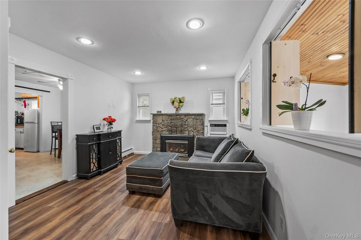 Fireplace, Interior, Living room, Recessed Lighting, Wooden Ceilings, Wood Texture Flooring