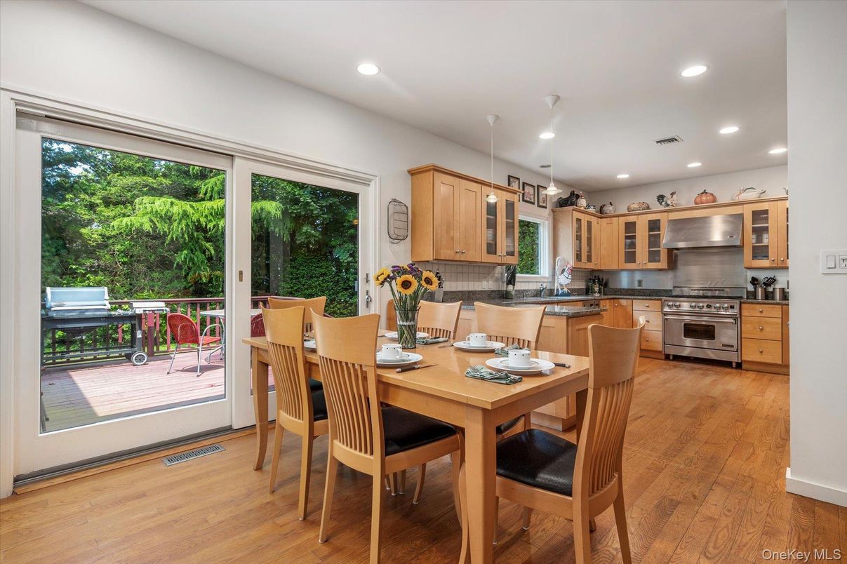Dining room, Interior, Kitchen, Pendant Lights, Recessed Lighting, Stainless Steel Appliances, Wood Texture Flooring