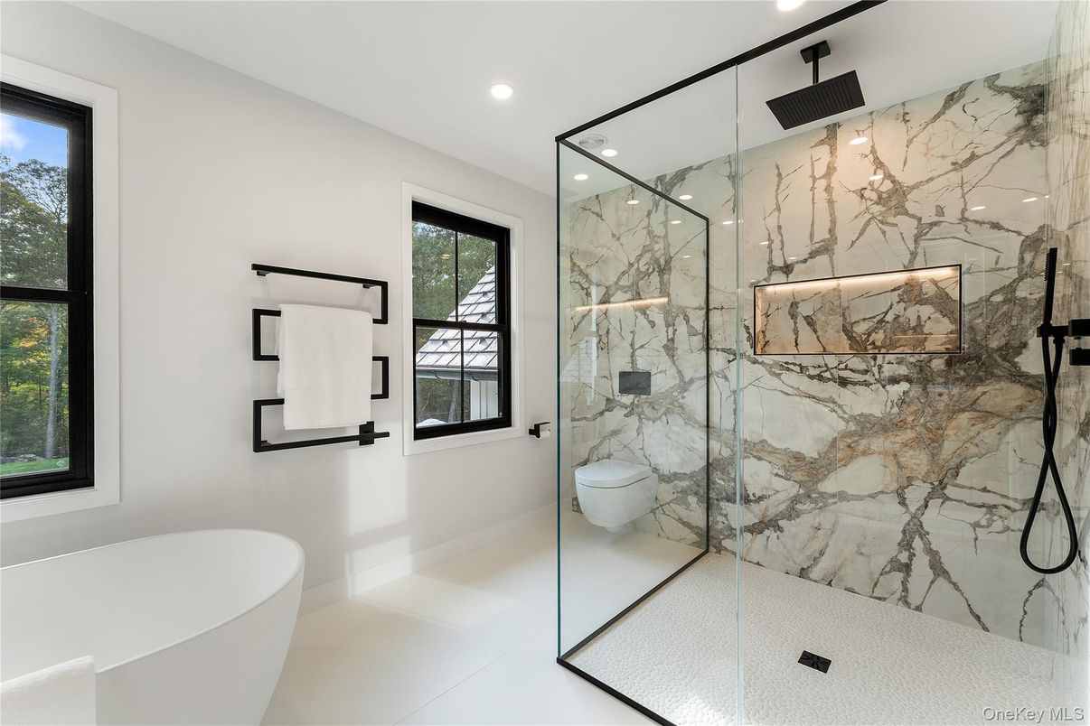 Bathroom, Free Standing Baths, Glass Shower, Interior, Marble Walls, Recessed Lighting