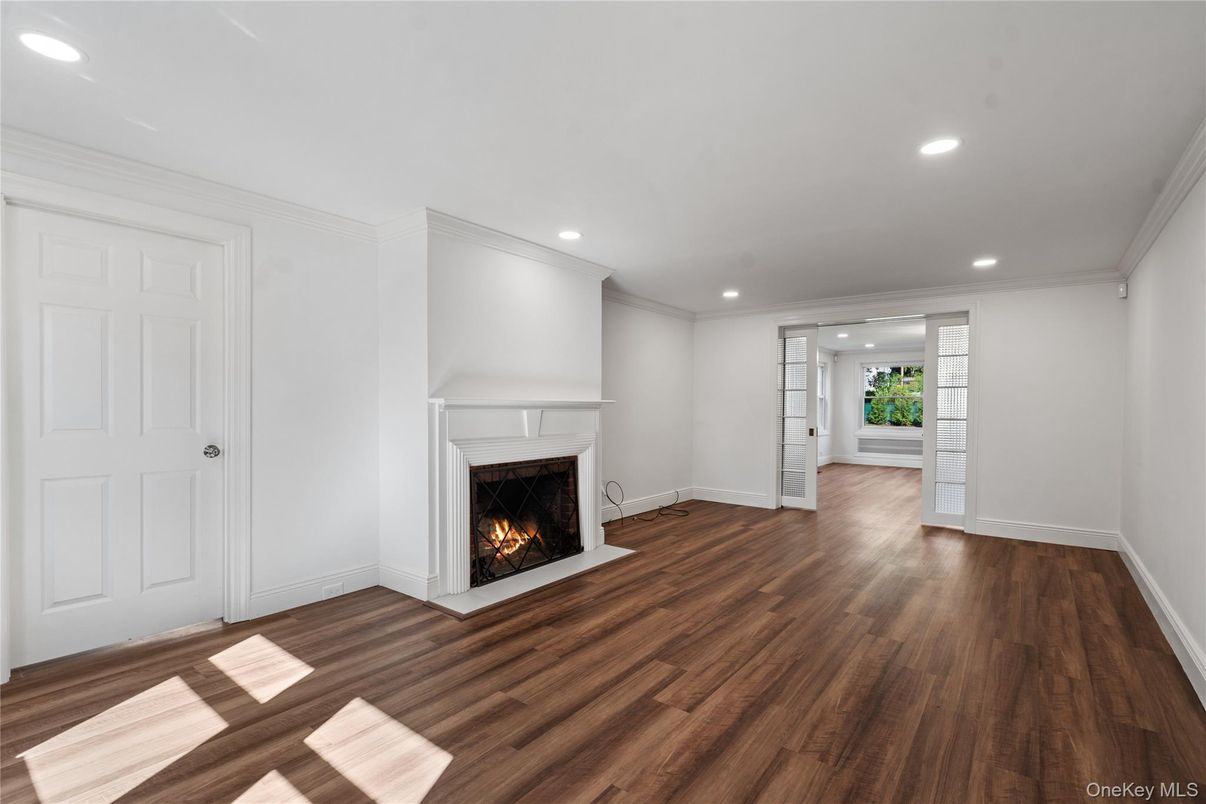 Empty room, Fireplace, Interior, Recessed Lighting, Wood Texture Flooring