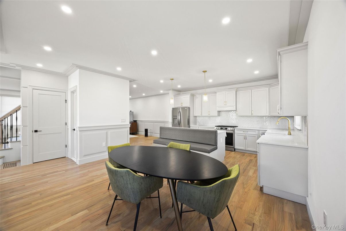 Dining room, Interior, Kitchen, Pendant Lights, Recessed Lighting, Stainless Steel Appliances, Wood Texture Flooring