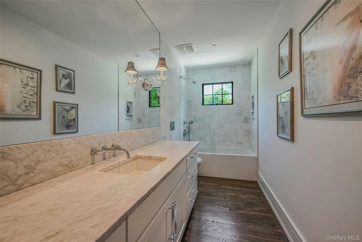 Bathroom, Glass Shower, Interior, Marble Walls, Recessed Lighting, Wood Texture Flooring
