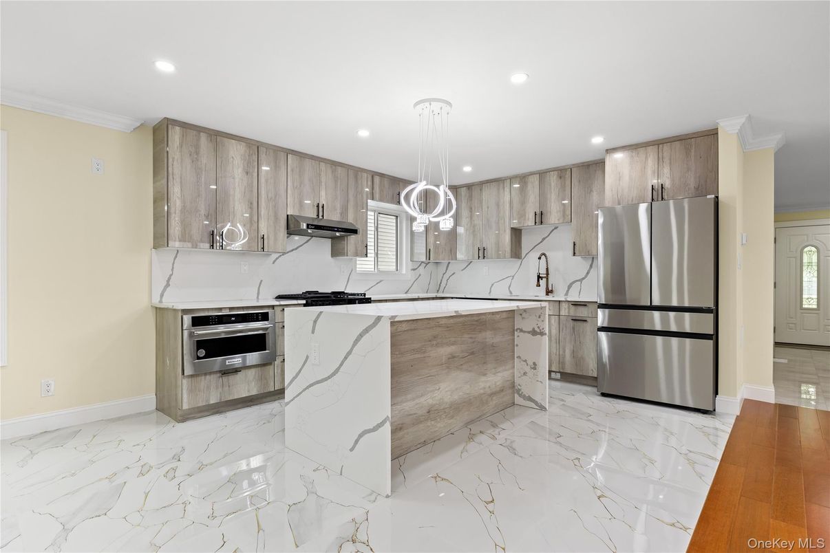 Interior, Kitchen, Marble, Marble Walls, Pendant Lights, Recessed Lighting, Stainless Steel Appliances