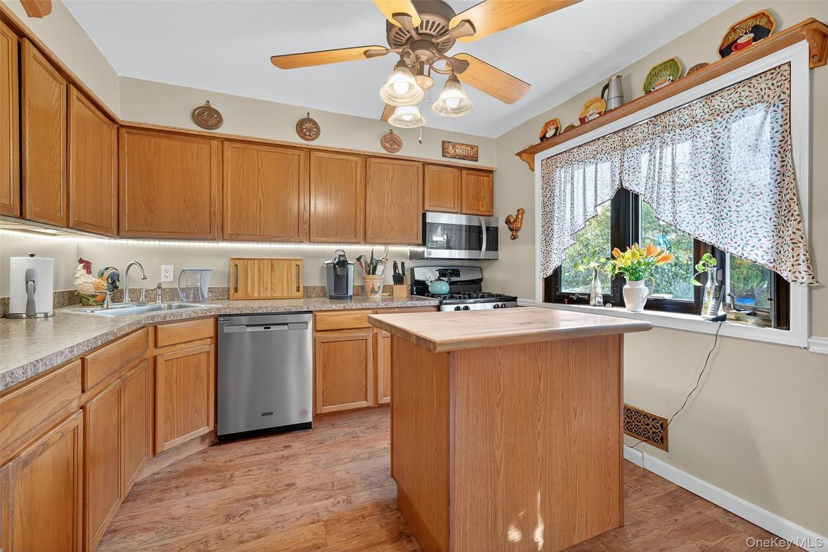 Interior, Kitchen, Tile Countertops, Wood Texture Flooring