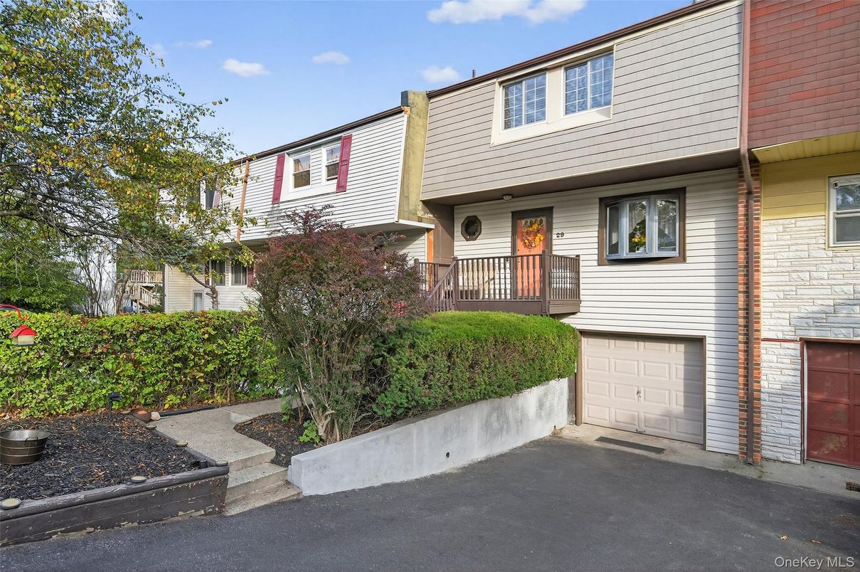 Attached, Exterior, Facade, Raised Ranch