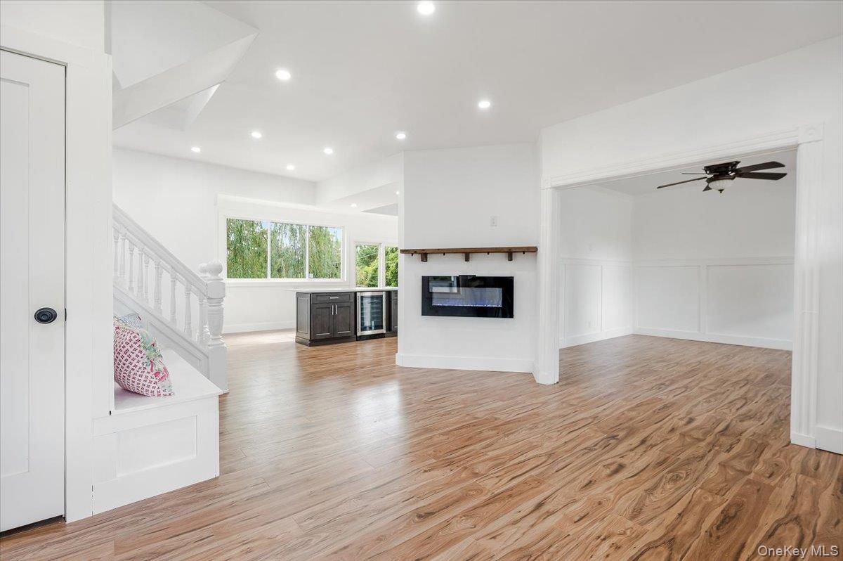 Empty room, Fireplace, Interior, Recessed Lighting, Wood Texture Flooring