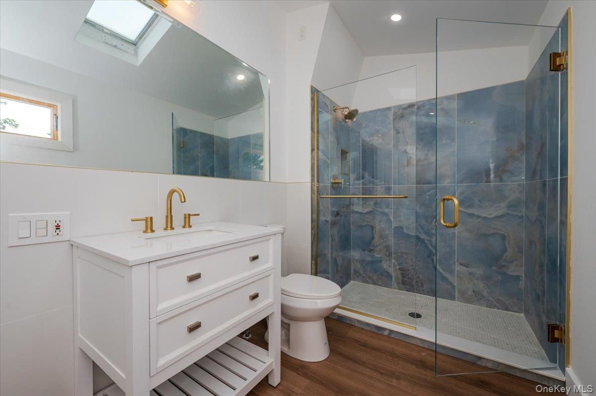 Bathroom, Glass Shower, Interior, Recessed Lighting, Wood Texture Flooring