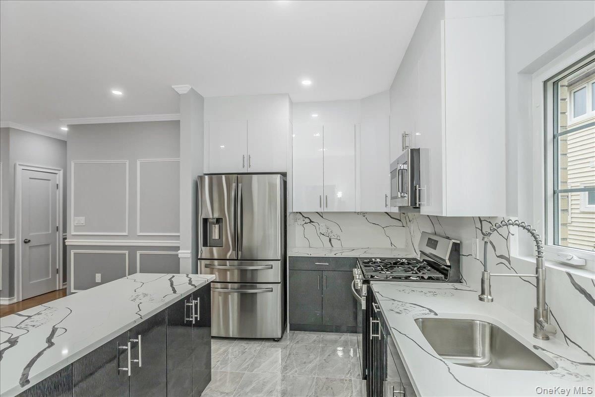 Interior, Kitchen, Marble, Marble Walls, Recessed Lighting, Stainless Steel Appliances