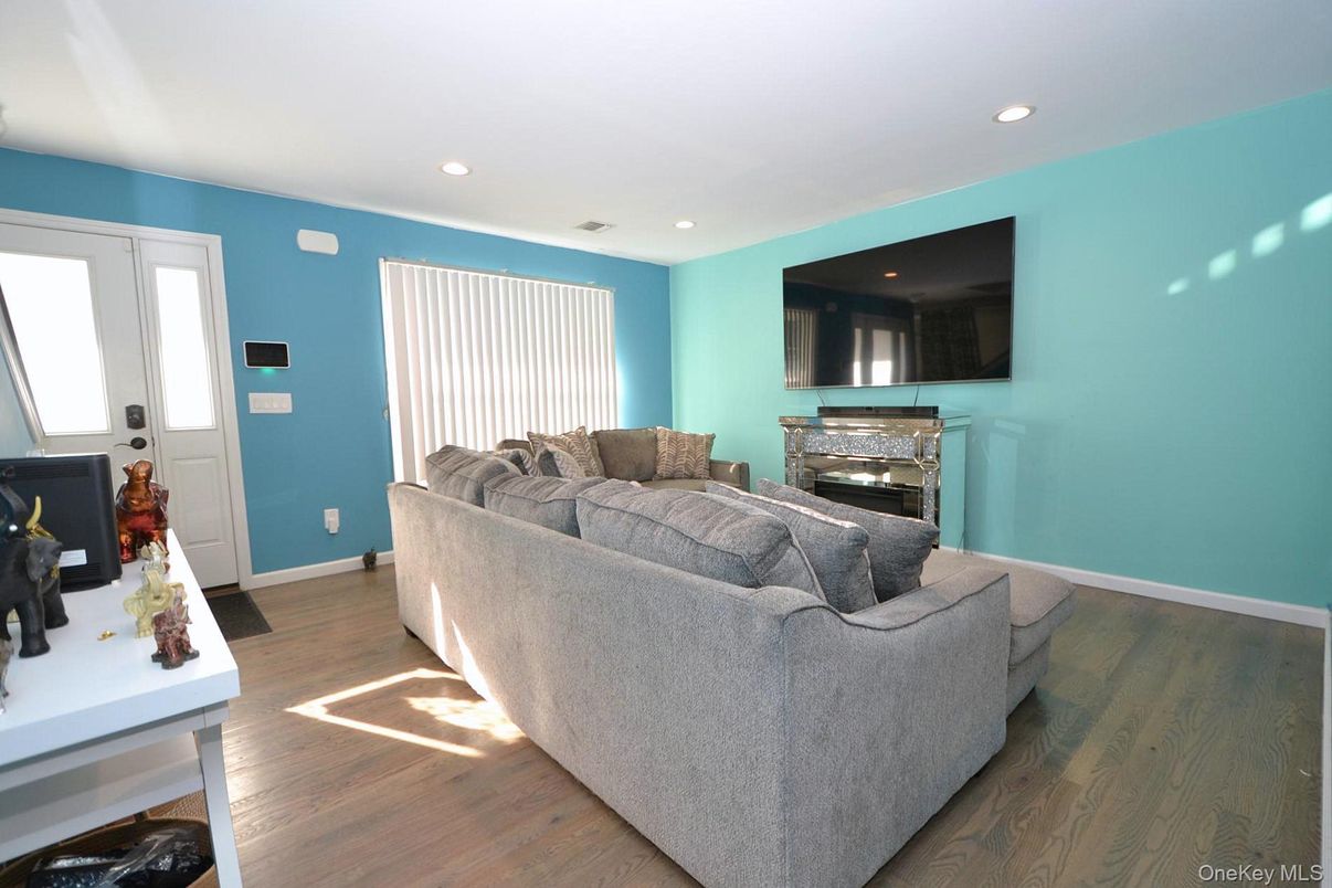 Fireplace, Interior, Living room, Recessed Lighting, Wood Texture Flooring