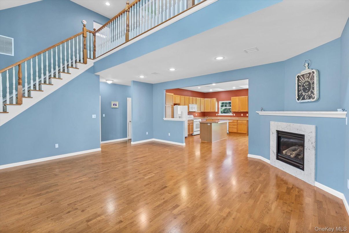 Fireplace, Interior, Kitchen, Recessed Lighting, Wood Texture Flooring