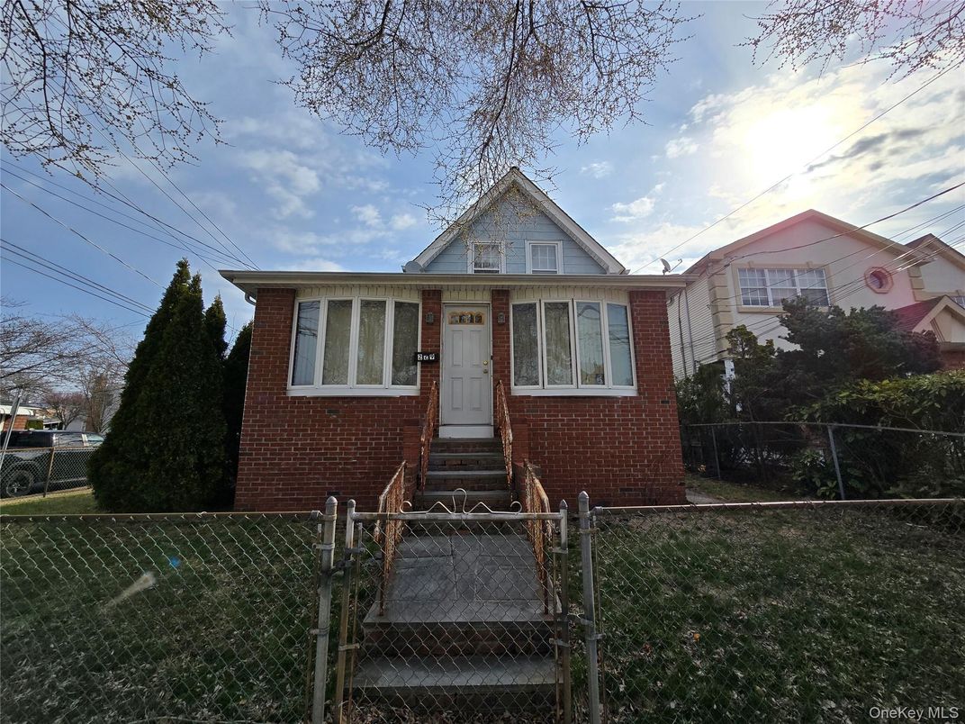 Exterior, Facade, Brick Facade, Cape Cod