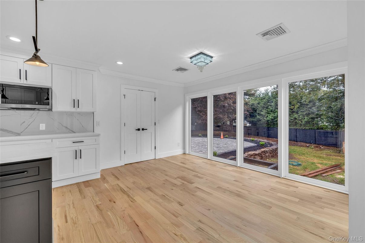 Interior, Kitchen, Marble Walls, Pendant Lights, Recessed Lighting, Wood Texture Flooring