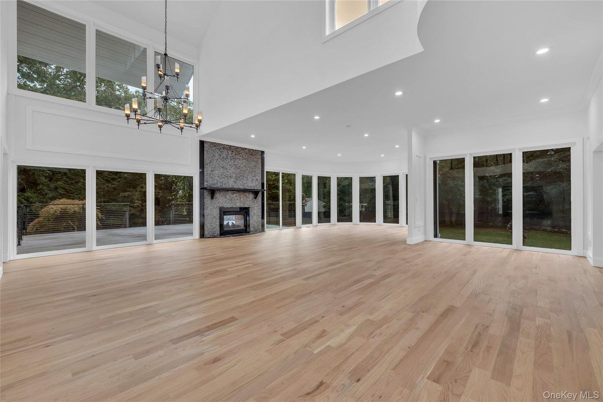 Empty room, Fireplace, Interior, Pendant Lights, Recessed Lighting, Wood Texture Flooring