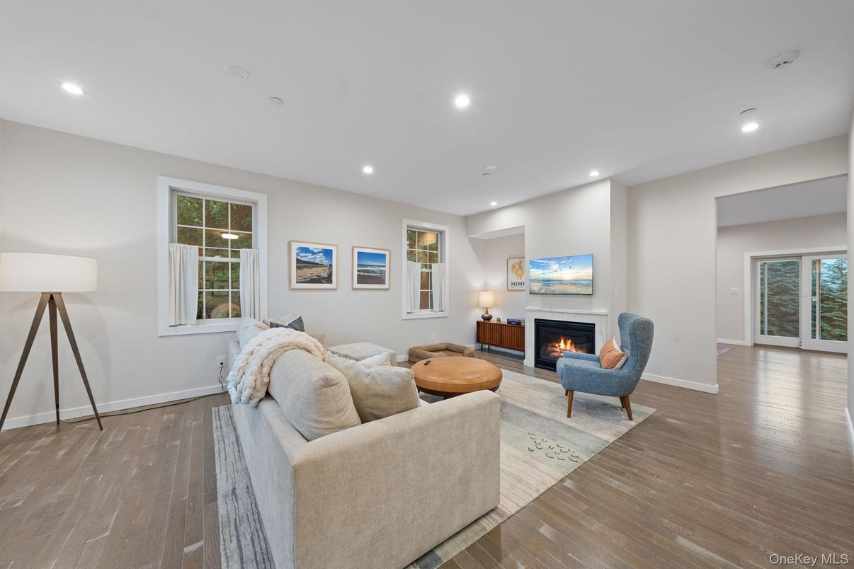 Fireplace, Interior, Living room, Recessed Lighting, Wood Texture Flooring