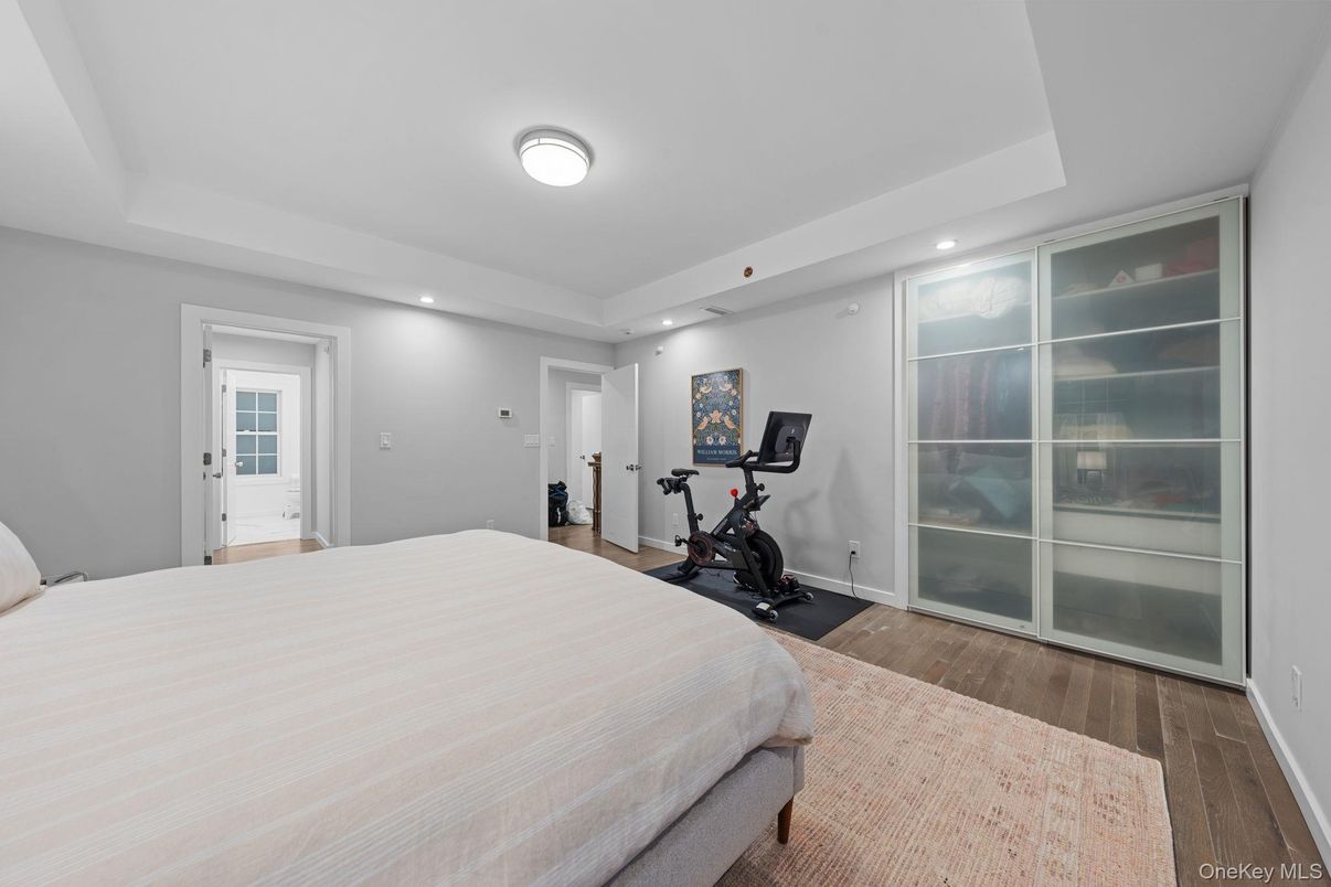 Bedroom, Fitness Equipment, Interior, Recessed Lighting, Wood Texture Flooring