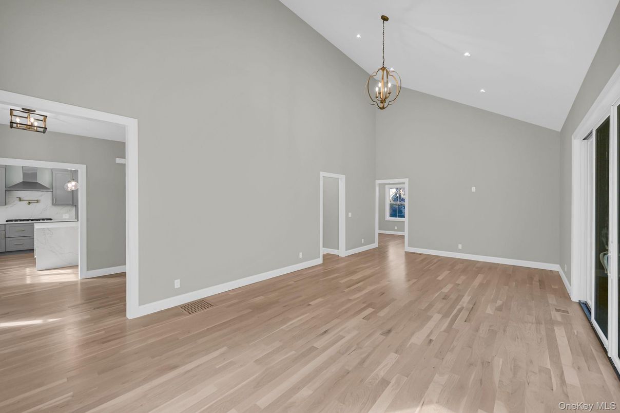 Empty room, Interior, Kitchen, Marble Walls, Pendant Lights, Recessed Lighting, Wood Texture Flooring