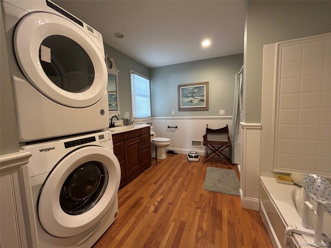 Bathroom, Interior, Recessed Lighting, Washer, Wood Texture Flooring